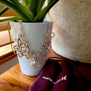 Silver bracelet with butterflies